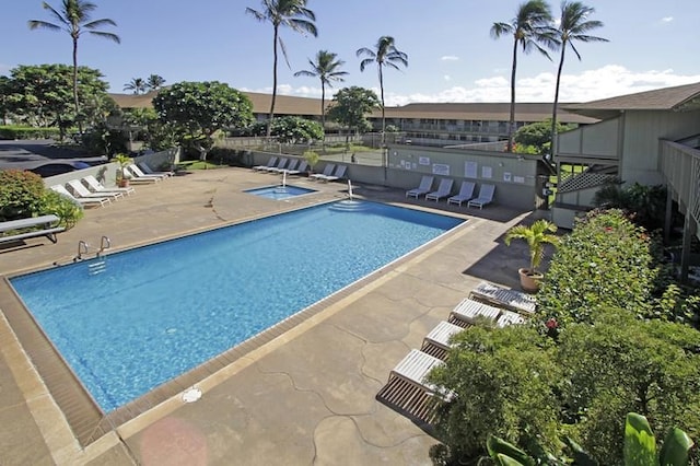 view of swimming pool with a patio area