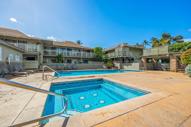 view of pool featuring a patio area