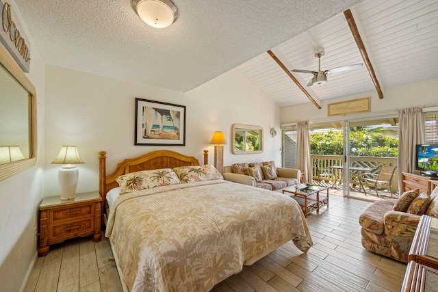 bedroom with access to exterior, light wood-type flooring, vaulted ceiling with beams, and ceiling fan