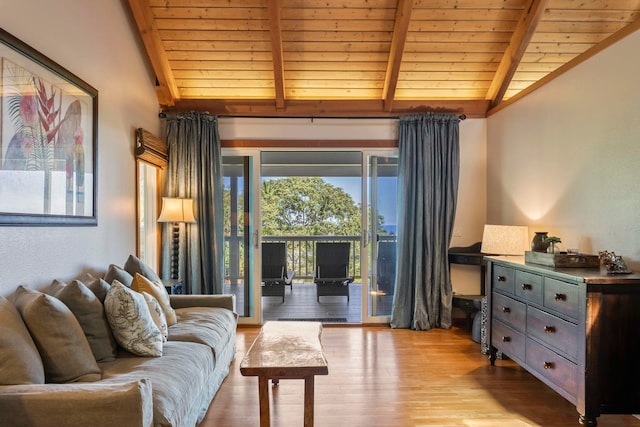 living room with light hardwood / wood-style flooring, lofted ceiling with beams, and wood ceiling