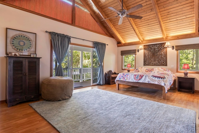 bedroom with access to exterior, high vaulted ceiling, wooden ceiling, wood finished floors, and beam ceiling