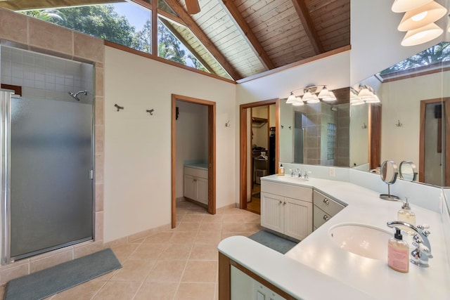 bathroom with a shower stall, wood ceiling, tile patterned floors, double vanity, and beam ceiling