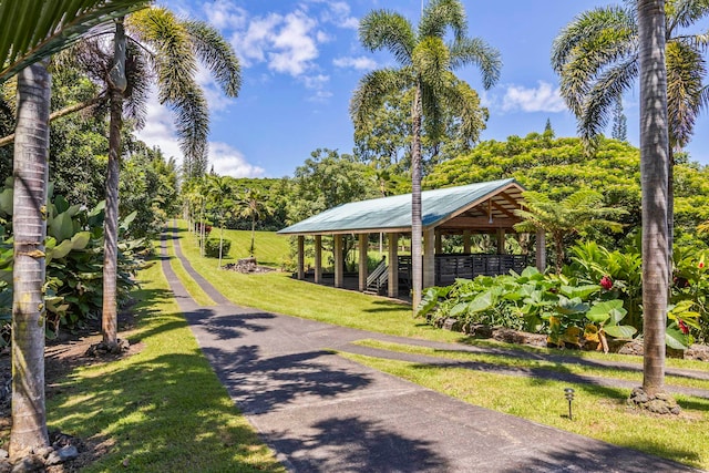 view of property's community featuring a gazebo and a lawn