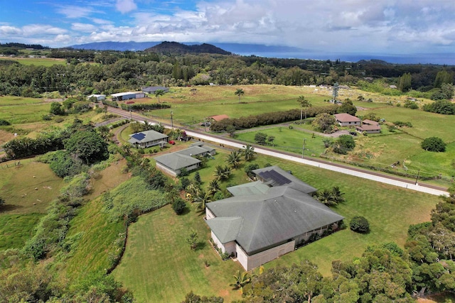 drone / aerial view with a mountain view and a rural view