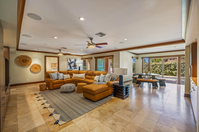 tiled living room with ceiling fan and ornamental molding