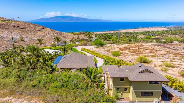 drone / aerial view featuring a mountain view