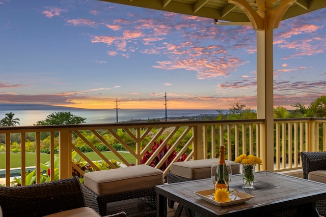 view of balcony at dusk