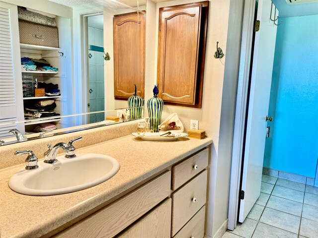 bathroom featuring vanity and tile patterned floors