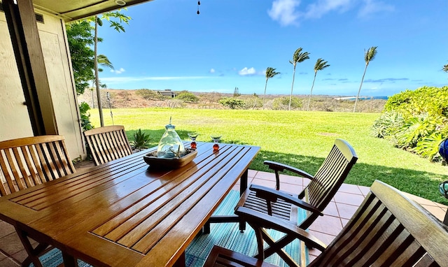 view of patio / terrace with a rural view