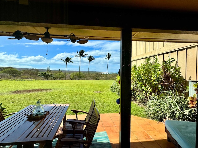 view of patio featuring a rural view and ceiling fan