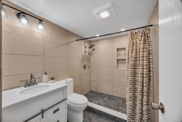 111 Kahului Beach Rd Unit D402, Kahului, HI 96732 - bathroom with toilet, tiled shower, recessed lighting, and vanity