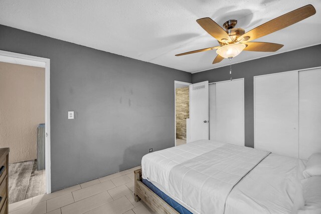 111 Kahului Beach Rd Unit D402, Kahului, HI 96732 - bedroom with multiple closets and ceiling fan