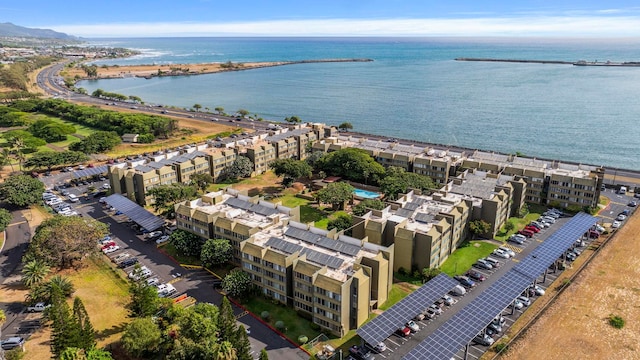 111 Kahului Beach Rd Unit D402, Kahului, HI 96732 - drone / aerial view of a large body of water and apartment complex / building