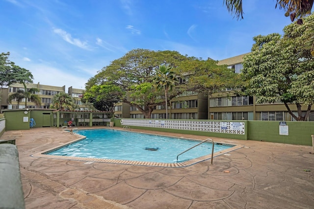 111 Kahului Beach Rd Unit D402, Kahului, HI 96732 - community pool featuring a patio and a residential view