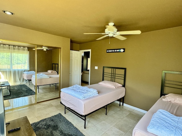 bedroom with a closet and ceiling fan