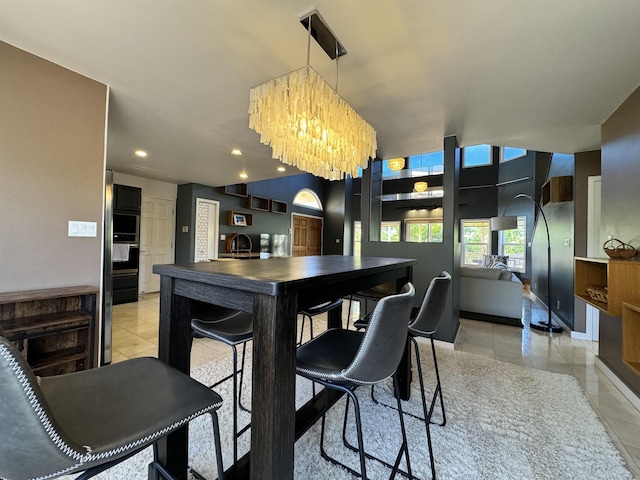 dining space featuring a chandelier