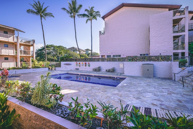 view of pool featuring a patio area