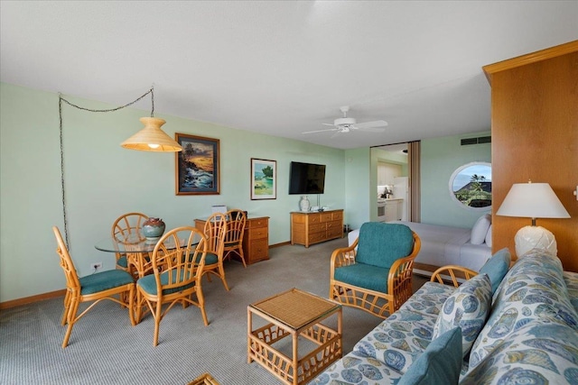 45 Kai Ala Dr Unit A409, Lahaina, HI 96761 - living area with carpet flooring, ceiling fan, and baseboards