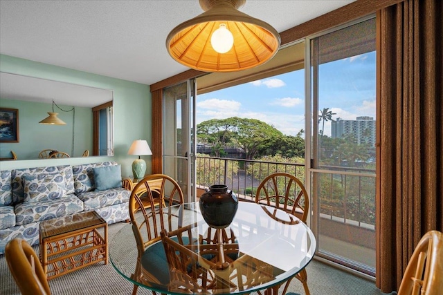 45 Kai Ala Dr Unit A409, Lahaina, HI 96761 - dining room with carpet flooring