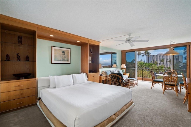 45 Kai Ala Dr Unit A409, Lahaina, HI 96761 - bedroom featuring dark colored carpet and a ceiling fan