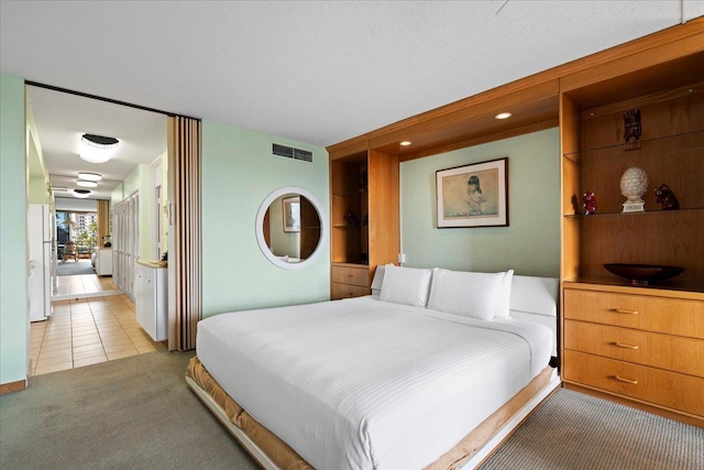45 Kai Ala Dr Unit A409, Lahaina, HI 96761 - bedroom featuring light colored carpet and light tile patterned floors