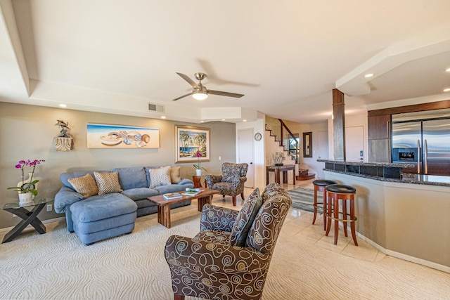150 Puukolii Rd Unit 18, Lahaina, HI 96761 - living room with stairway, ceiling fan, light colored carpet, baseboards, and recessed lighting