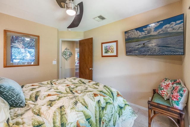 150 Puukolii Rd Unit 18, Lahaina, HI 96761 - bedroom with light tile patterned flooring, baseboards, and ceiling fan