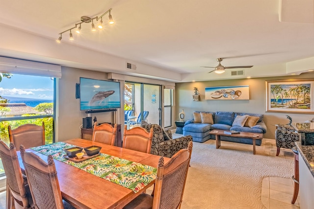 150 Puukolii Rd Unit 18, Lahaina, HI 96761 - dining space with a ceiling fan and rail lighting