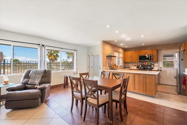980 Kuhio Pl, Wailuku, HI 96793 - dining area with light tile patterned floors, recessed lighting, and baseboards