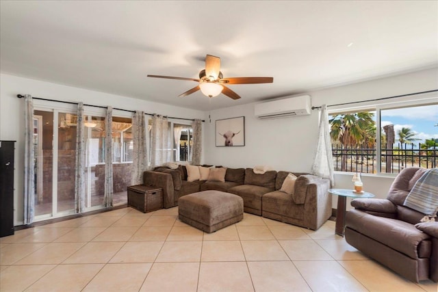 980 Kuhio Pl, Wailuku, HI 96793 - living room with a wall unit AC, a ceiling fan, and light tile patterned floors