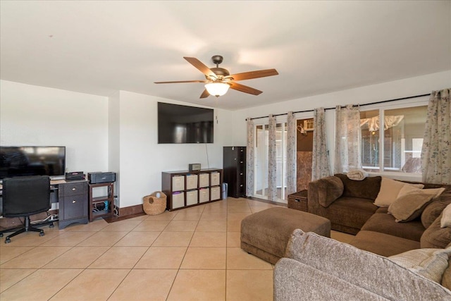980 Kuhio Pl, Wailuku, HI 96793 - living area featuring light tile patterned floors, ceiling fan, plenty of natural light, and a desk