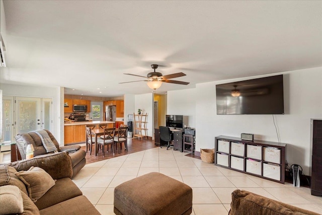 980 Kuhio Pl, Wailuku, HI 96793 - living room with light tile patterned floors and a ceiling fan