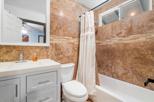 980 Kuhio Pl, Wailuku, HI 96793 - bathroom with toilet, vanity, shower / tub combo with curtain, and tile walls