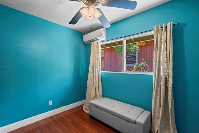 980 Kuhio Pl, Wailuku, HI 96793 - unfurnished room featuring a wall unit AC, wood finished floors, baseboards, and ceiling fan