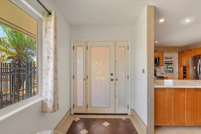 980 Kuhio Pl, Wailuku, HI 96793 - foyer entrance featuring light tile patterned floors, recessed lighting, and baseboards