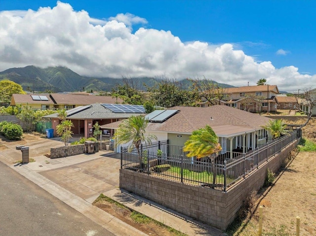 980 Kuhio Pl, Wailuku, HI 96793 - exterior space with driveway, a mountain view, solar panels, and a residential view