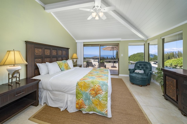 tiled bedroom with access to exterior, ceiling fan, lofted ceiling with beams, and multiple windows