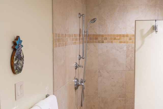 details featuring tiled shower