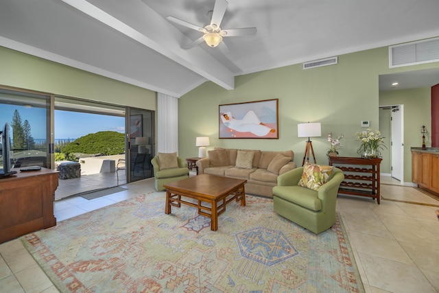 living room featuring ceiling fan, light tile patterned floors, and lofted ceiling with beams