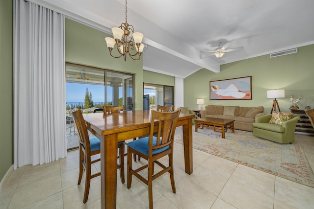 tiled dining room with ceiling fan with notable chandelier and lofted ceiling with beams