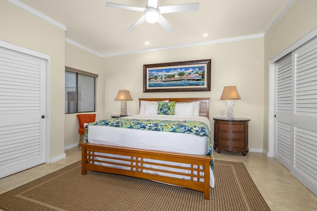 bedroom featuring a closet, ceiling fan, crown molding, and light tile patterned floors