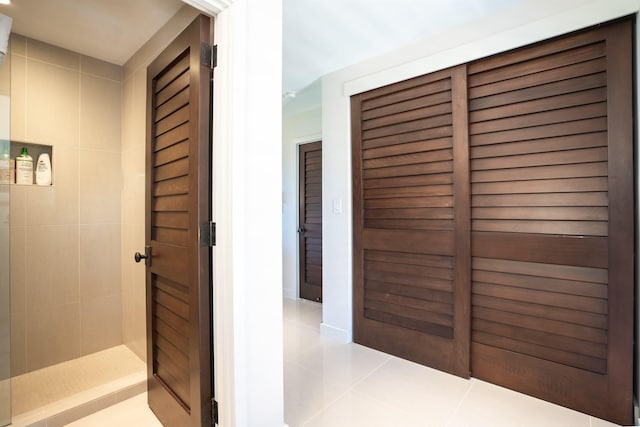 hallway featuring light tile patterned floors