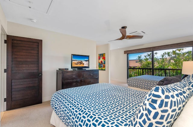 bedroom with access to exterior, light colored carpet, and ceiling fan