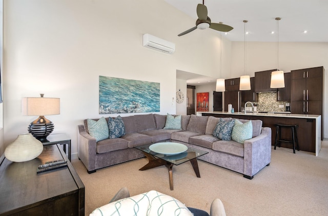 carpeted living room with a wall mounted air conditioner, high vaulted ceiling, and ceiling fan