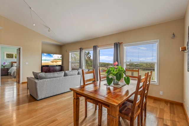 50 Uakoko Pl, Haiku, HI 96708 - dining space with vaulted ceiling, light wood-style flooring, and baseboards