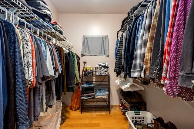 spacious closet featuring light wood-type flooring