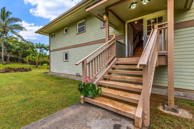 property entrance featuring a yard