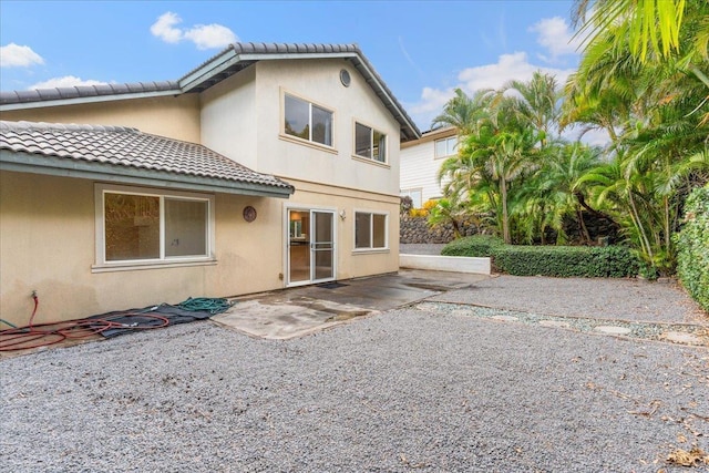 rear view of house with a patio area