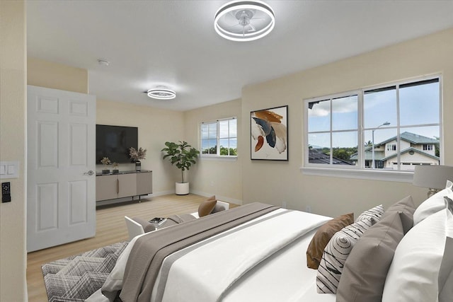 bedroom featuring light wood-type flooring