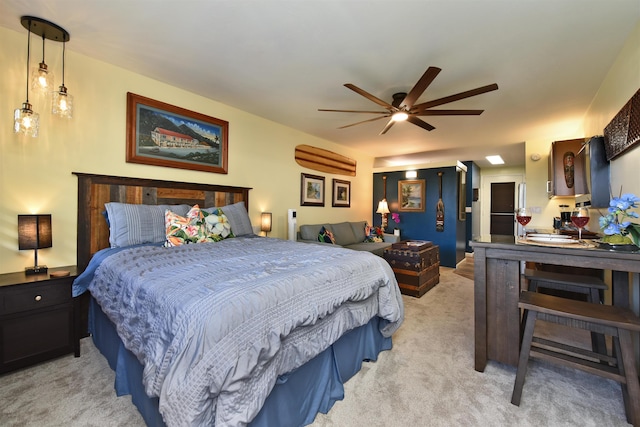 bedroom featuring ceiling fan and light colored carpet